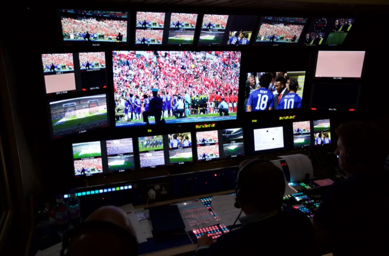 behind the mic the human element in sports broadcasting