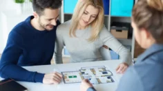 couple-meeting-with-real-estate-agent